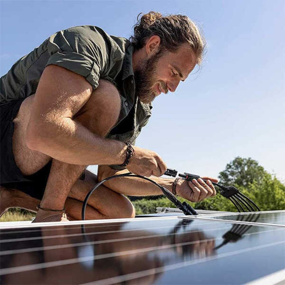 A Man Installing BougeRV Solar Y Connector Solar Panel Parallel Connectors Extra Long 5 to 1 Cable