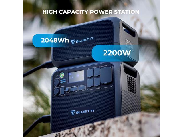 wo stacked portable power stations outdoors with labels showing a high capacity of 2048Wh and a power output of 2200W
